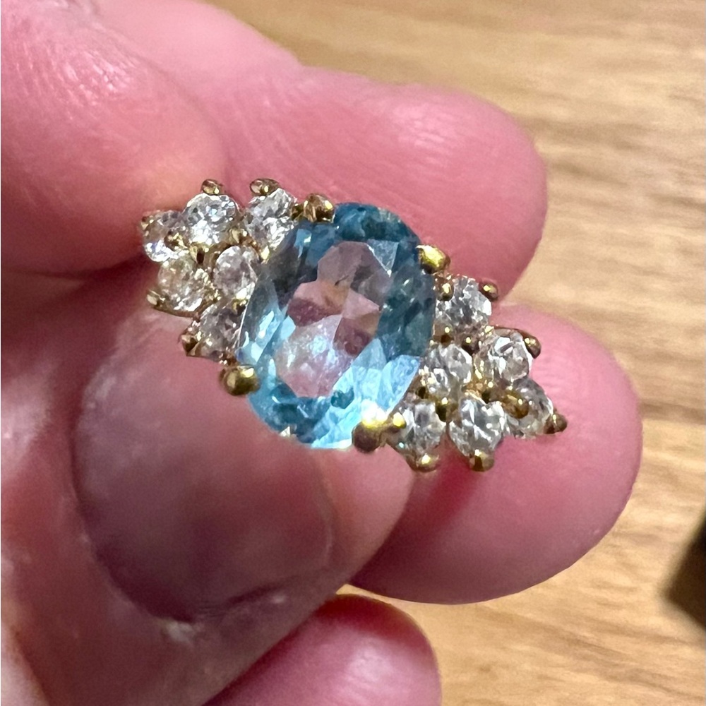 Elegant Blue Topaz and Gold Tone Ring